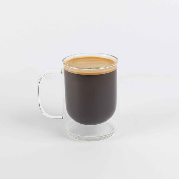 Brewed Coffee in a glass mug on a white background
