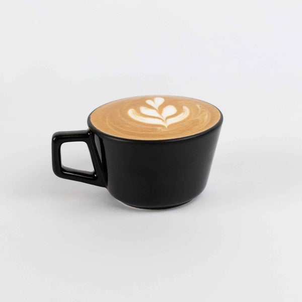 Coffee in a mug on a white background