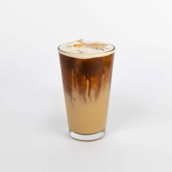 Glass of iced coffee with a white background