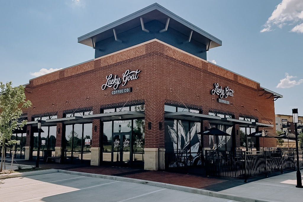 Brick bulding with Lucky Goat Coffee Co sign